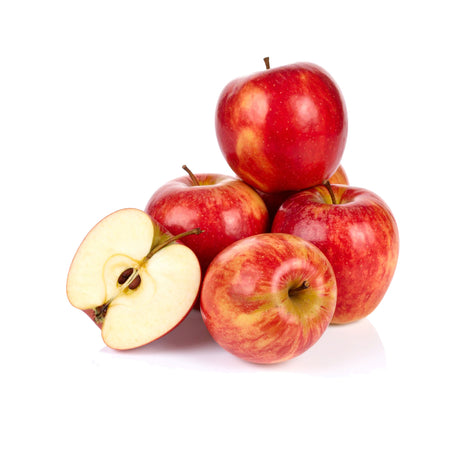 Red apples with one sliced on a white background